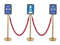 Rope barrier stands in gold color and three A4 frames with advertising print