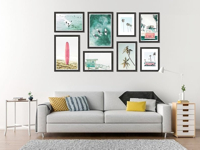 Composition of magnetic frames and drawings with photos on the wall