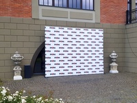 Photo booth with sponsor logos for photography, available for rent